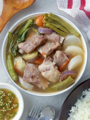 Sinigang na Baboy? A Mouthwatering Symphony of Sour and Savory Flavors!