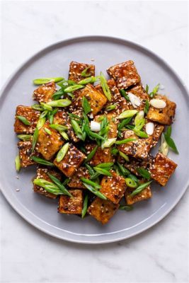  Gegrilde Sanming Tofu met Sesam- en Knoflookglazuur: Een Vegetarische Smaakbom Ontploft in Je Mond!